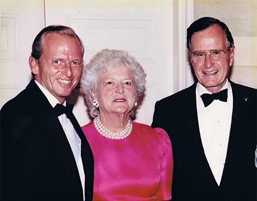 President Bush and Barbara Bush greet Brennan at the White House in 1992.