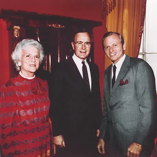 The Vice President and Barbara Bush greet Brennan at their residence.
