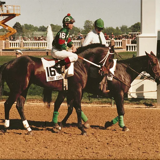 Due Process Stables’ Fobby Forbes draws into the 1986 Kentucky Derby as number 16 and gets a dreaded outside post position on an otherwise spectacular day.