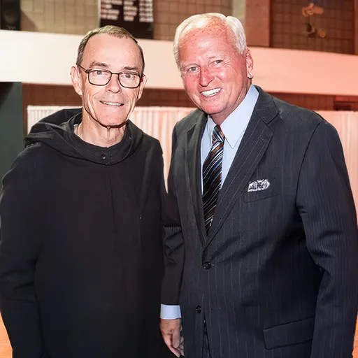 Fr. Edwin Leahy, OSB, St. Benedict’s headmaster of more than 50 years, and Brennan in 2022.